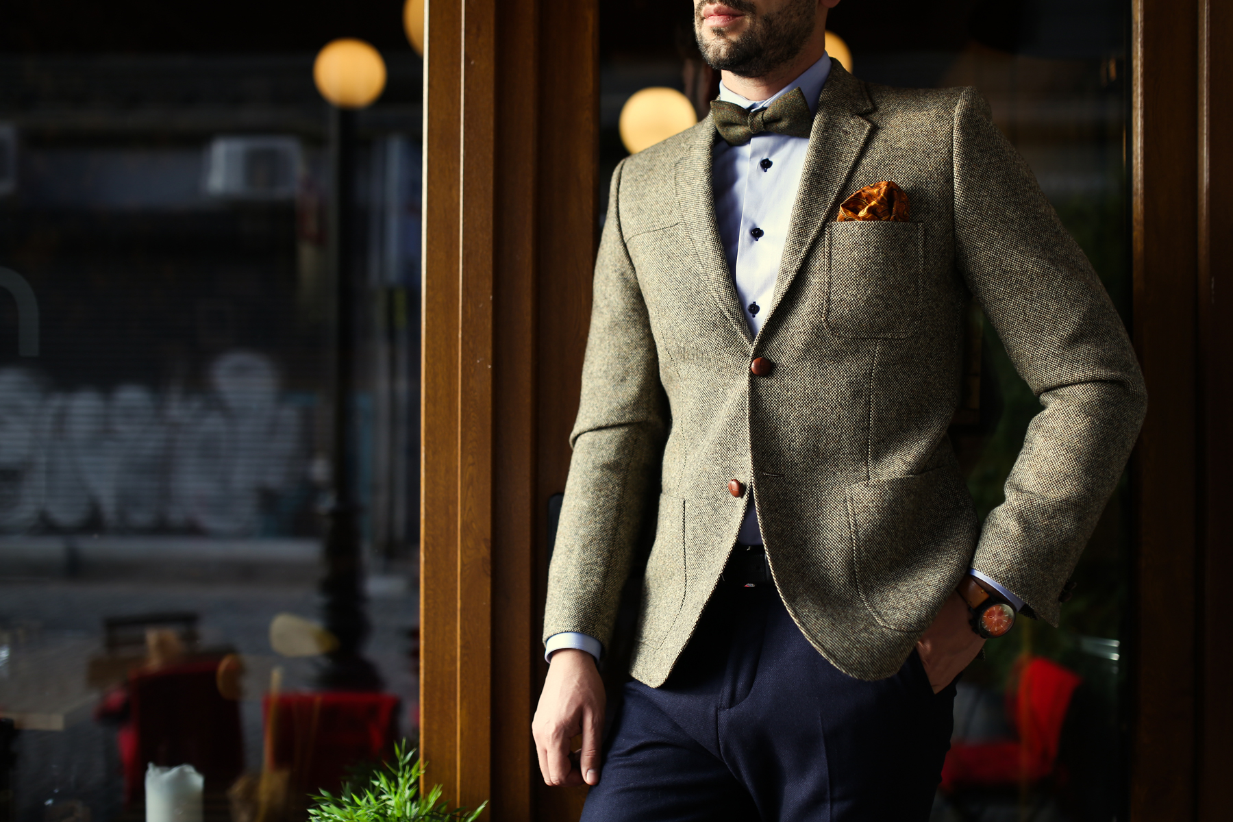 A modern gentleman in a jacket and a bowtie