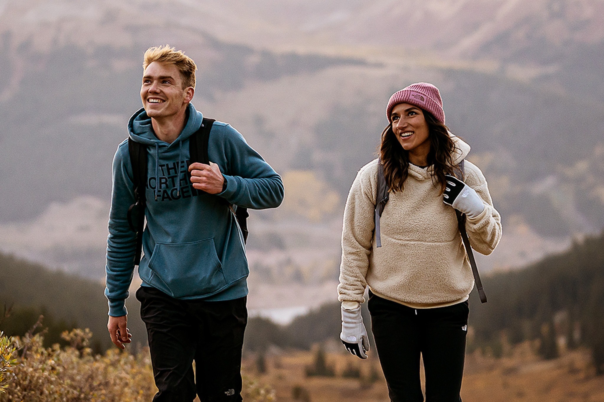 Couple wearing North Face fleeces
